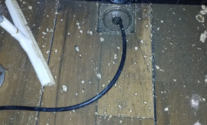 Débouchage d'une bonde de sol dans les WC dans un restaurant à DARDILLY, Beynost, NOVEAX