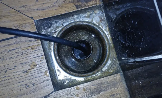 Débouchage d'une bonde de sol dans les WC dans un restaurant à DARDILLY, Beynost, NOVEAX